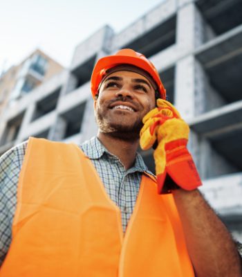 young-construction-worker-in-uniform-using-walkie-2021-09-29-23-12-25-utc.jpg